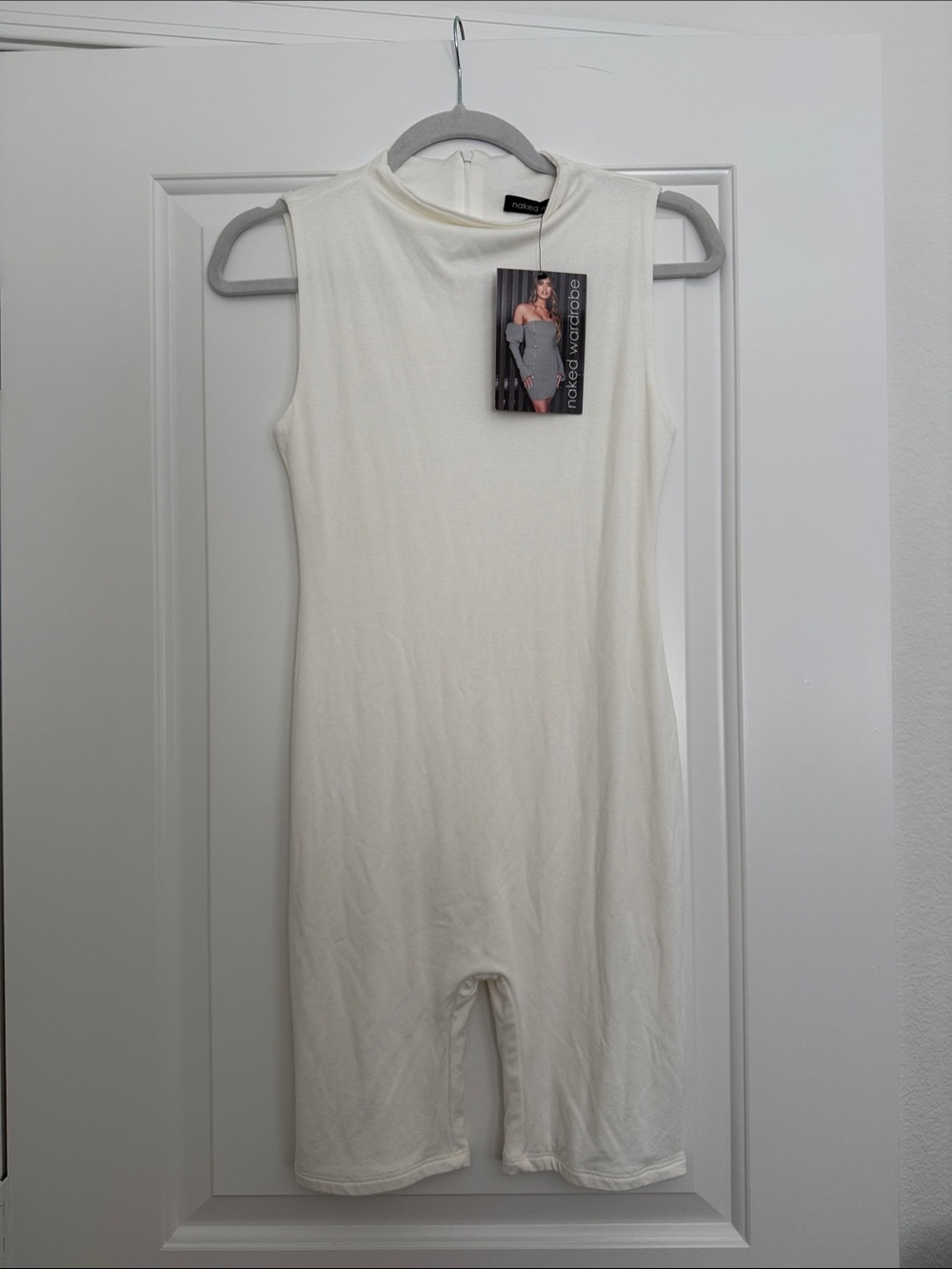 naked wardrobe NWT Size Large Cream Sleeveless One-Piece Bodysuit Romper